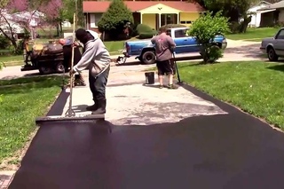 Oddly satisfying video of a driveway being sealed
